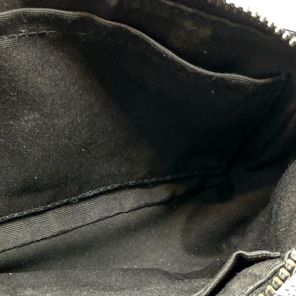 Coach Nolita 19 wristlet/pouch with a red heart appliqué. - Picture 10 of 16